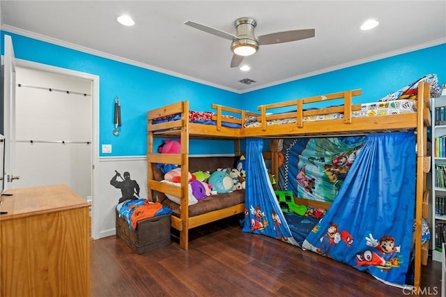 bedroom with recessed lighting, visible vents, wood finished floors, and crown molding