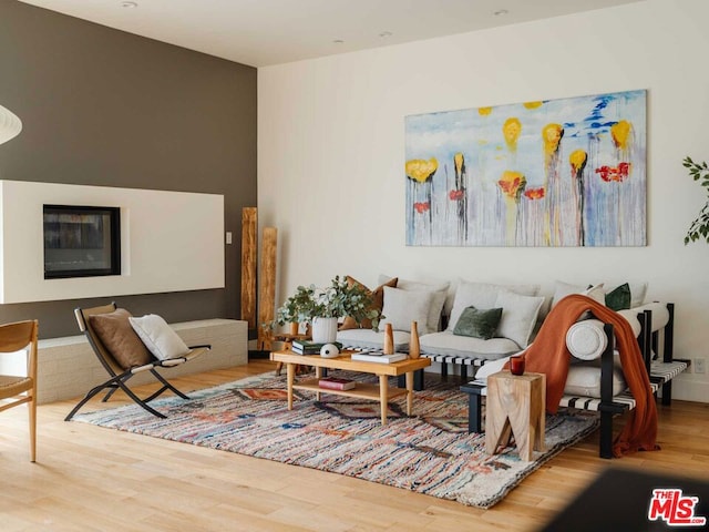 sitting room featuring hardwood / wood-style floors