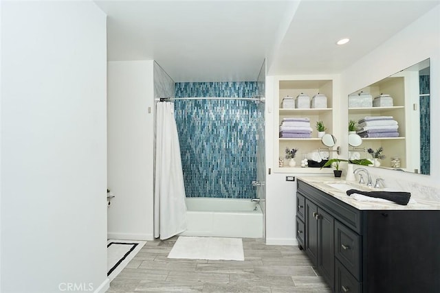 bathroom with vanity and shower / bath combo with shower curtain