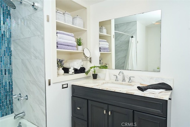 bathroom with vanity and shower / bath combo with shower curtain