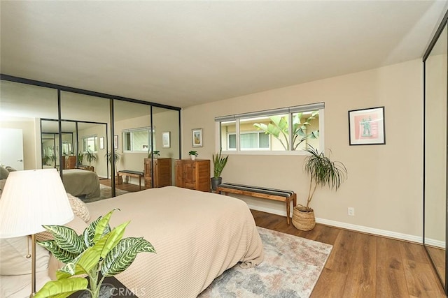 bedroom with wood-type flooring