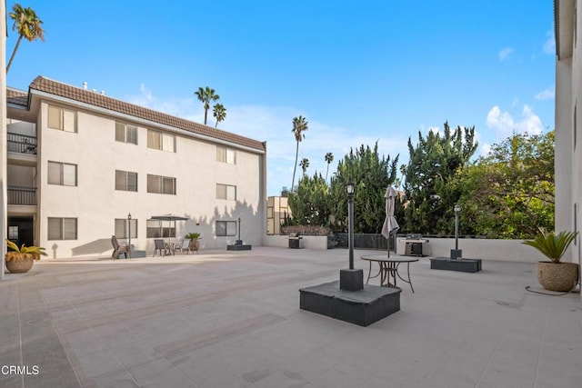 view of community with a patio area
