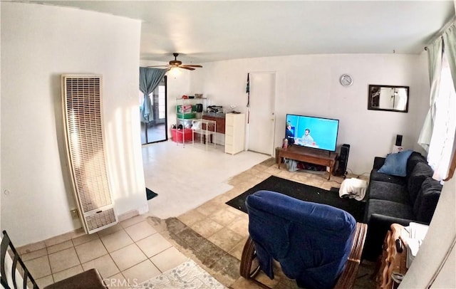 living room with light tile patterned floors and ceiling fan