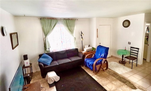 living room featuring light tile patterned flooring