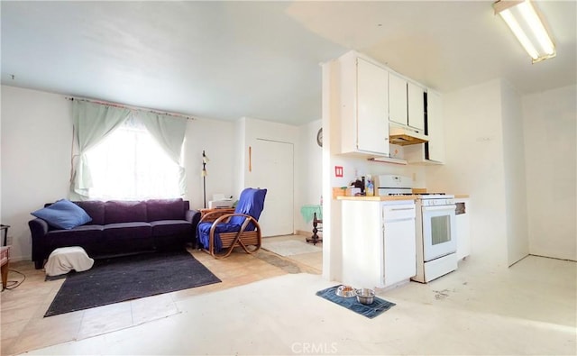 kitchen with gas range gas stove and white cabinets