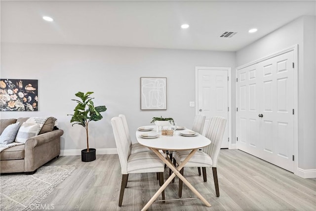 dining area featuring light hardwood / wood-style floors