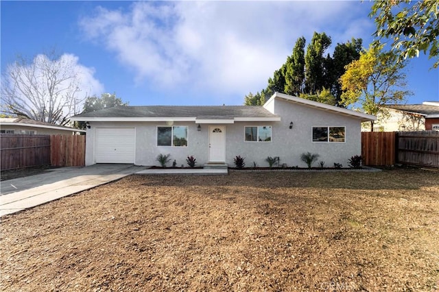 single story home featuring a garage