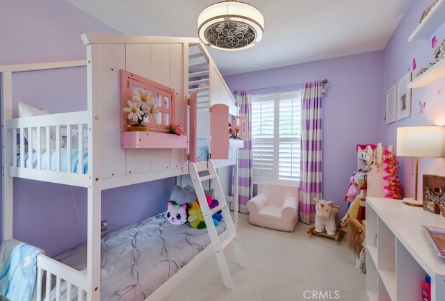 bedroom with light colored carpet