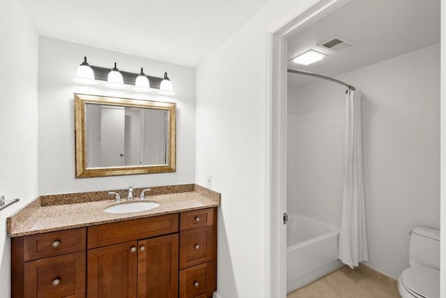 full bathroom featuring shower / tub combo with curtain, vanity, tile patterned floors, and toilet