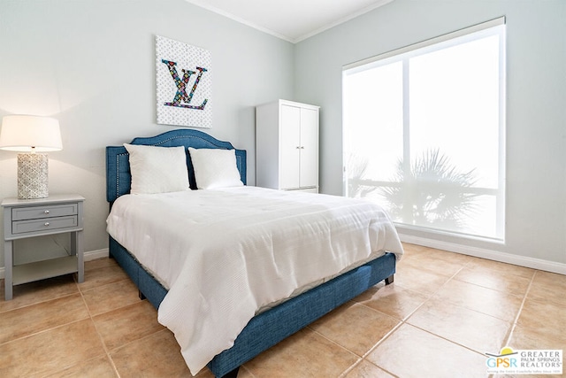 tiled bedroom with ornamental molding