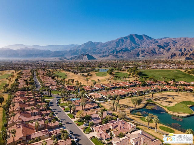 bird's eye view featuring a water and mountain view