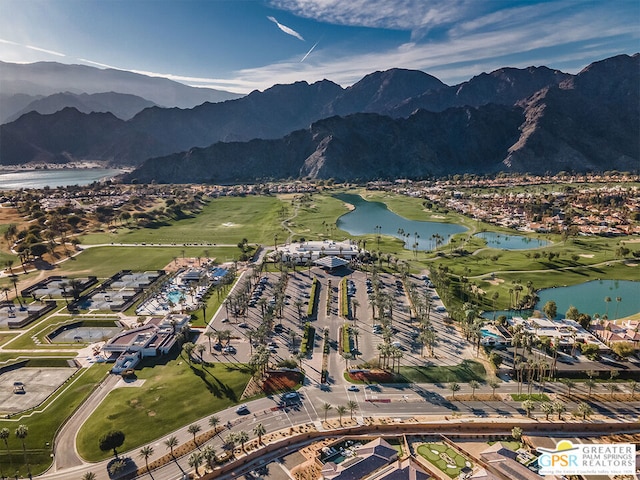 aerial view featuring a water and mountain view