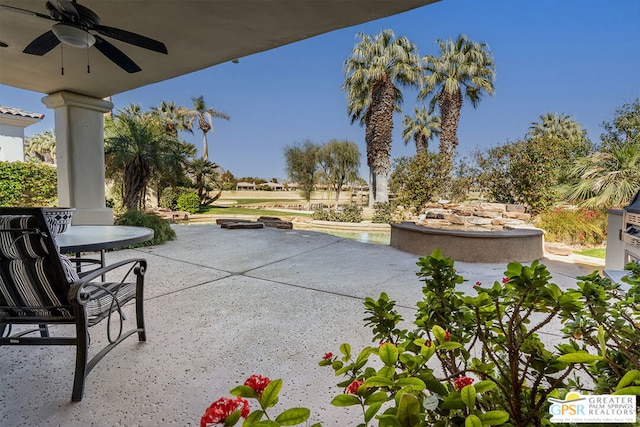 view of patio / terrace featuring ceiling fan