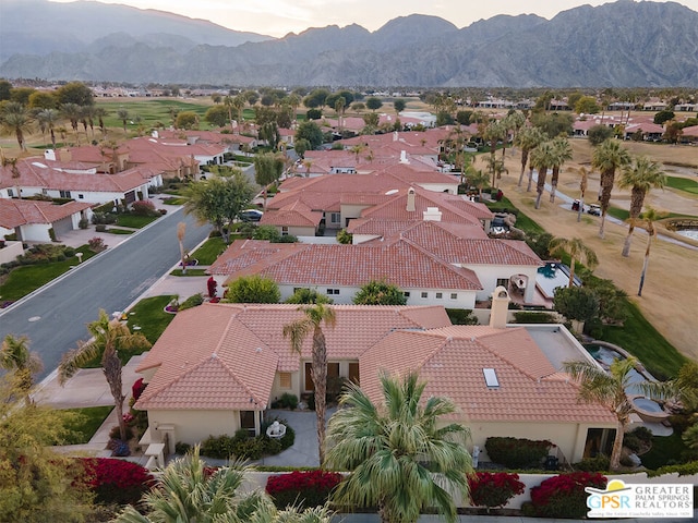 drone / aerial view featuring a mountain view