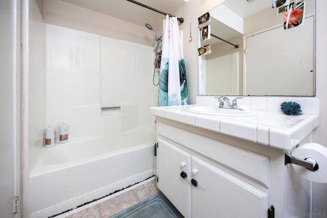 bathroom featuring tile patterned floors, shower / bathtub combination with curtain, and vanity