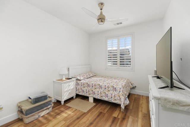 bedroom featuring ceiling fan and light wood-type flooring