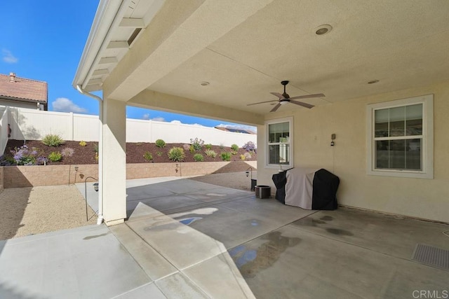 view of patio / terrace featuring ceiling fan and grilling area