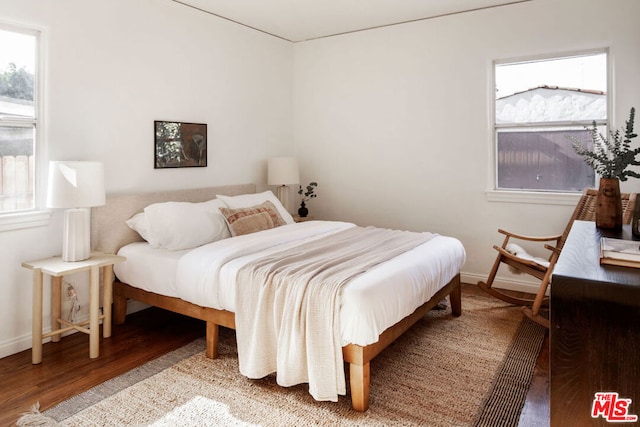 bedroom featuring hardwood / wood-style flooring