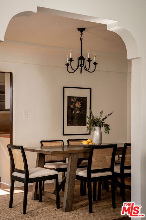 dining room with a notable chandelier