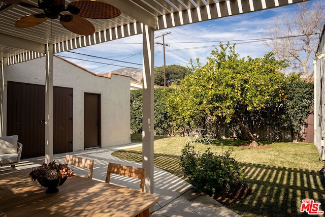 view of patio with ceiling fan