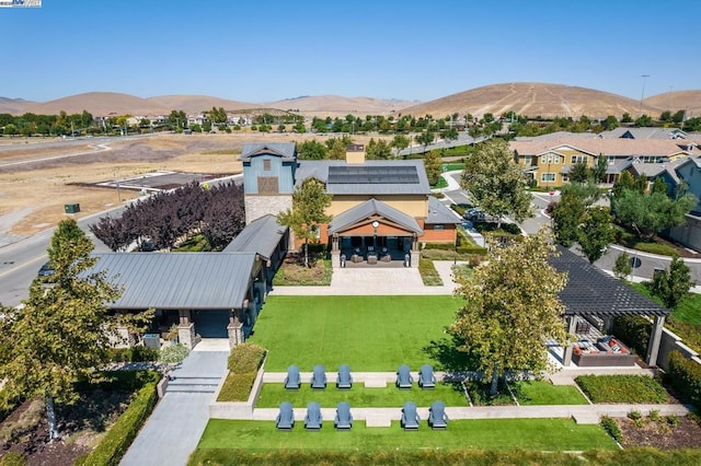 drone / aerial view featuring a mountain view