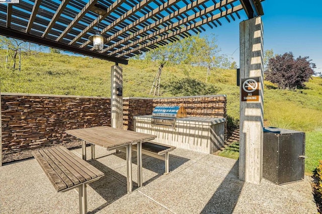 view of patio featuring a pergola