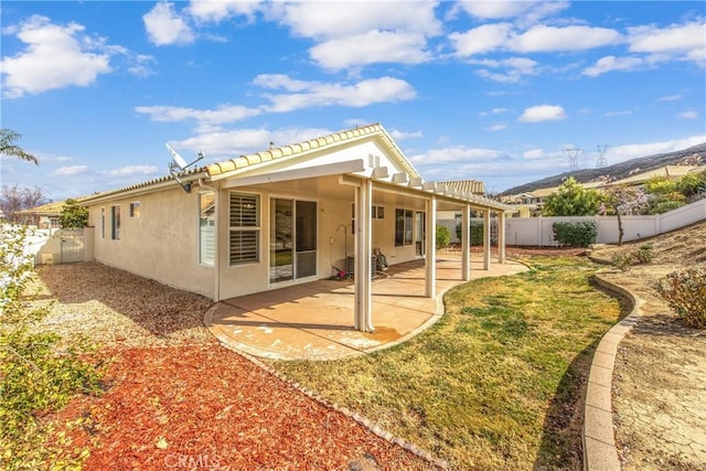 back of house with a patio and a pergola