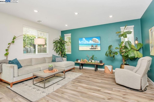 living room featuring light wood-type flooring