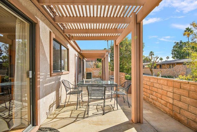 view of patio / terrace featuring a pergola