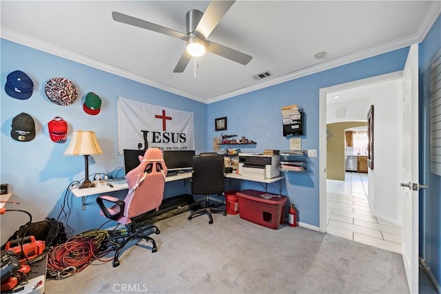 home office with crown molding, carpet floors, and ceiling fan