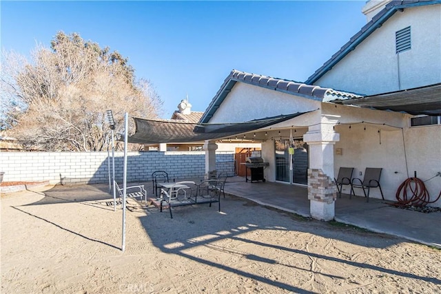 view of patio featuring grilling area