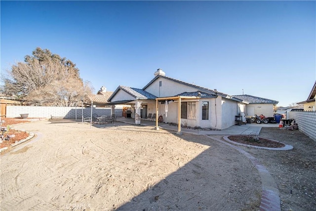 view of front of home with a patio area