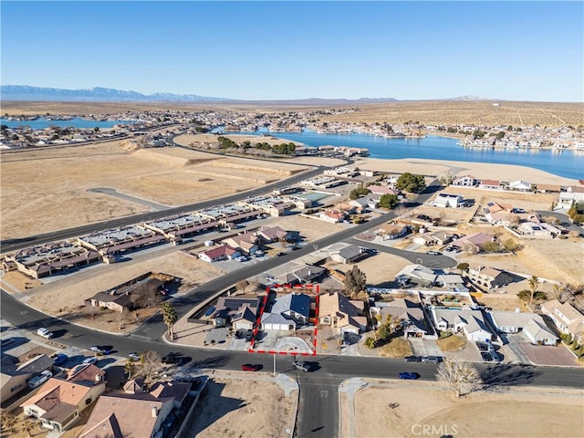 aerial view with a water and mountain view