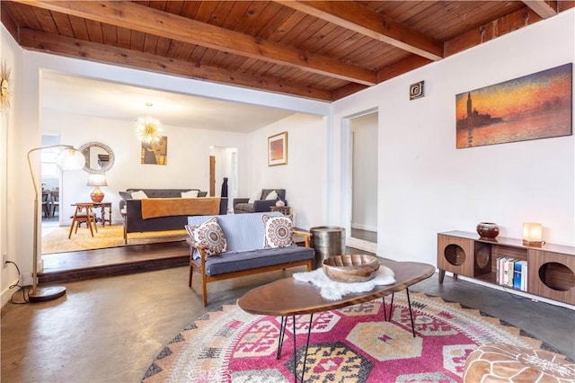 living room with wood ceiling, concrete floors, and beamed ceiling