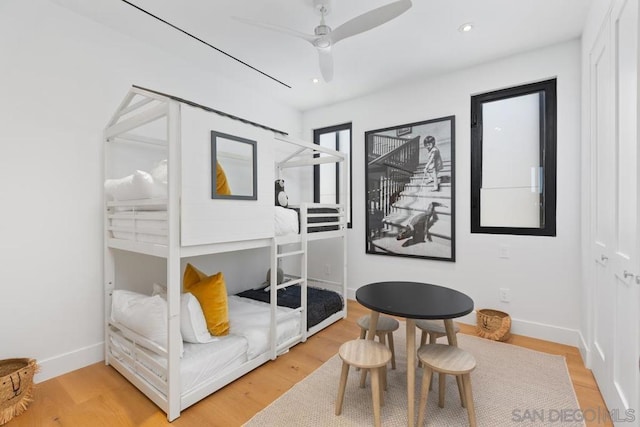 interior space featuring hardwood / wood-style flooring and ceiling fan