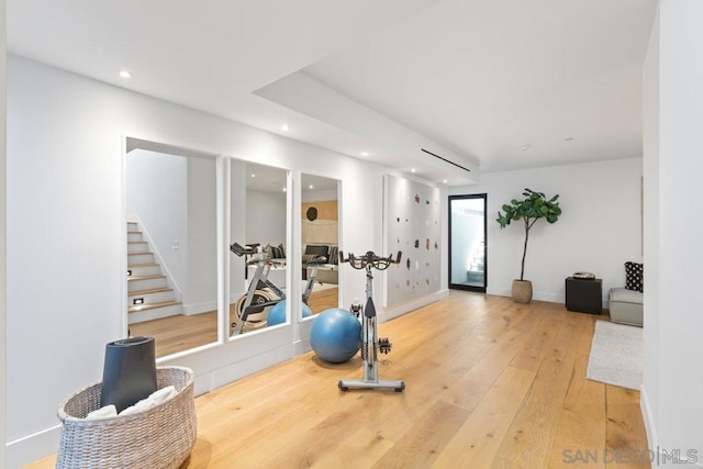 exercise area with hardwood / wood-style flooring