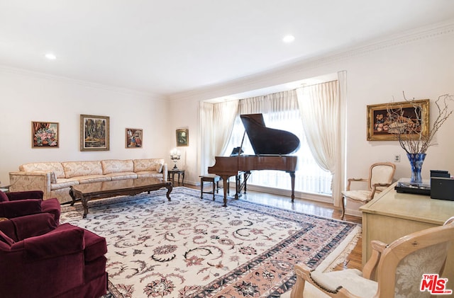 living room featuring crown molding and wood-type flooring