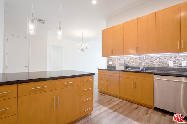 kitchen featuring sink, decorative light fixtures, light hardwood / wood-style flooring, stainless steel dishwasher, and decorative backsplash