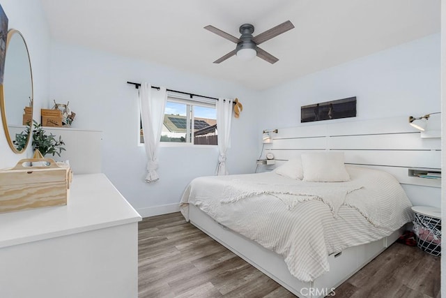 bedroom with ceiling fan and light wood-type flooring