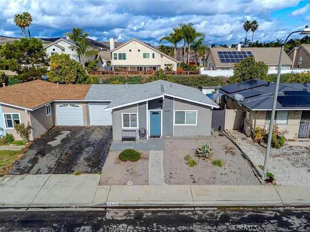 single story home featuring a garage