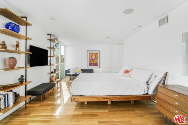 bedroom featuring light hardwood / wood-style flooring