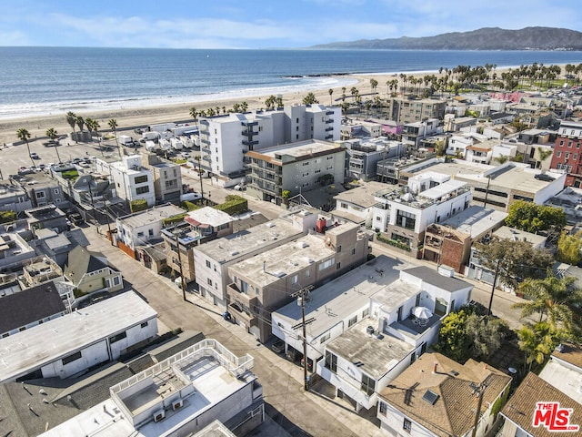 aerial view with a beach view and a water view