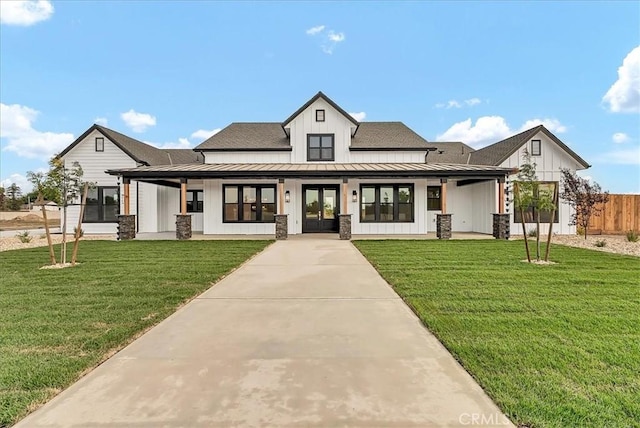 605 S Anderson Rd, Exeter, CA 93221 - modern inspired farmhouse featuring board and batten siding, a standing seam roof, french doors, metal roof, and stone siding