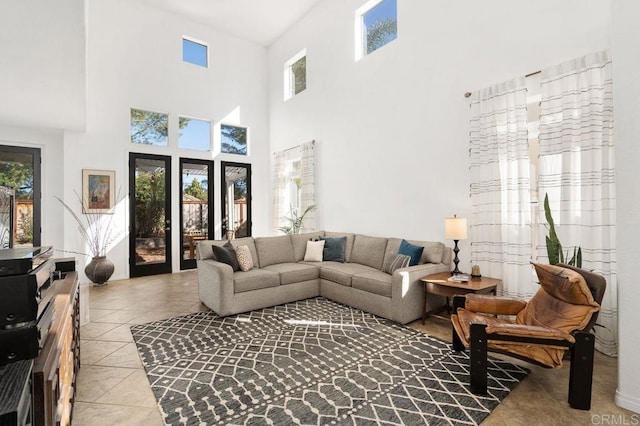 living room featuring light tile patterned floors and plenty of natural light