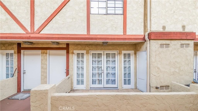 entrance to property with french doors