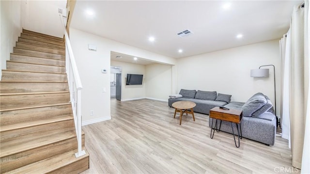 living room featuring light hardwood / wood-style floors