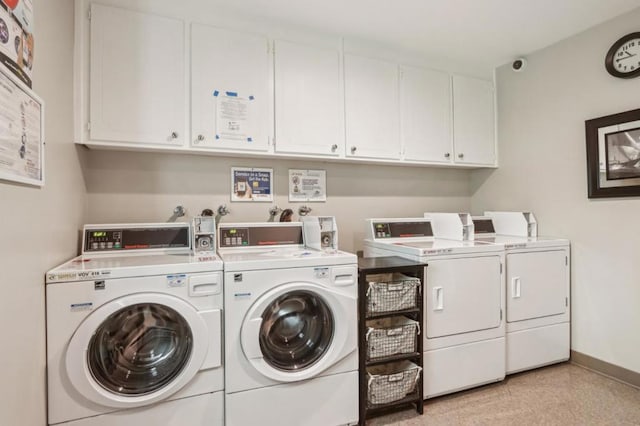 laundry area featuring washing machine and dryer