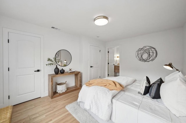 bedroom featuring light wood-type flooring