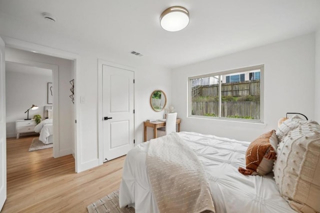 bedroom featuring light hardwood / wood-style floors