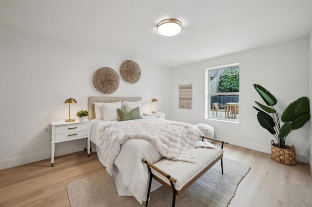 bedroom featuring light wood-type flooring